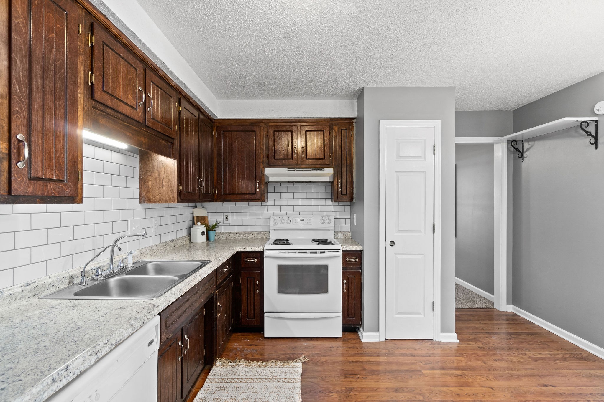 742 Needmore Road Clarksville, TN 37040 - Photo 15 of 35 a kitchen with a sink stove and refrigerator