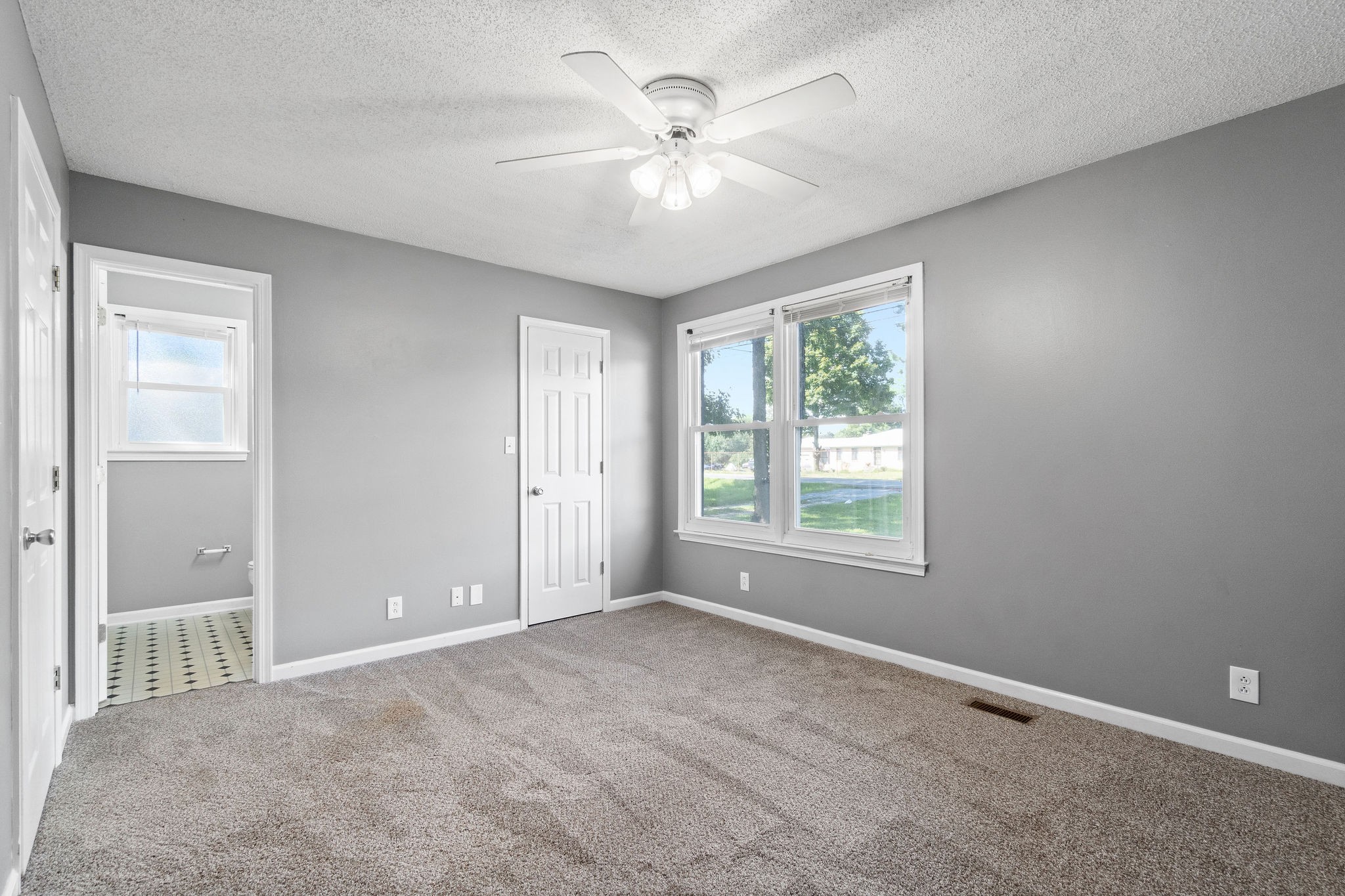 742 Needmore Road Clarksville, TN 37040 - Photo 18 of 35 a view of an empty room with a window