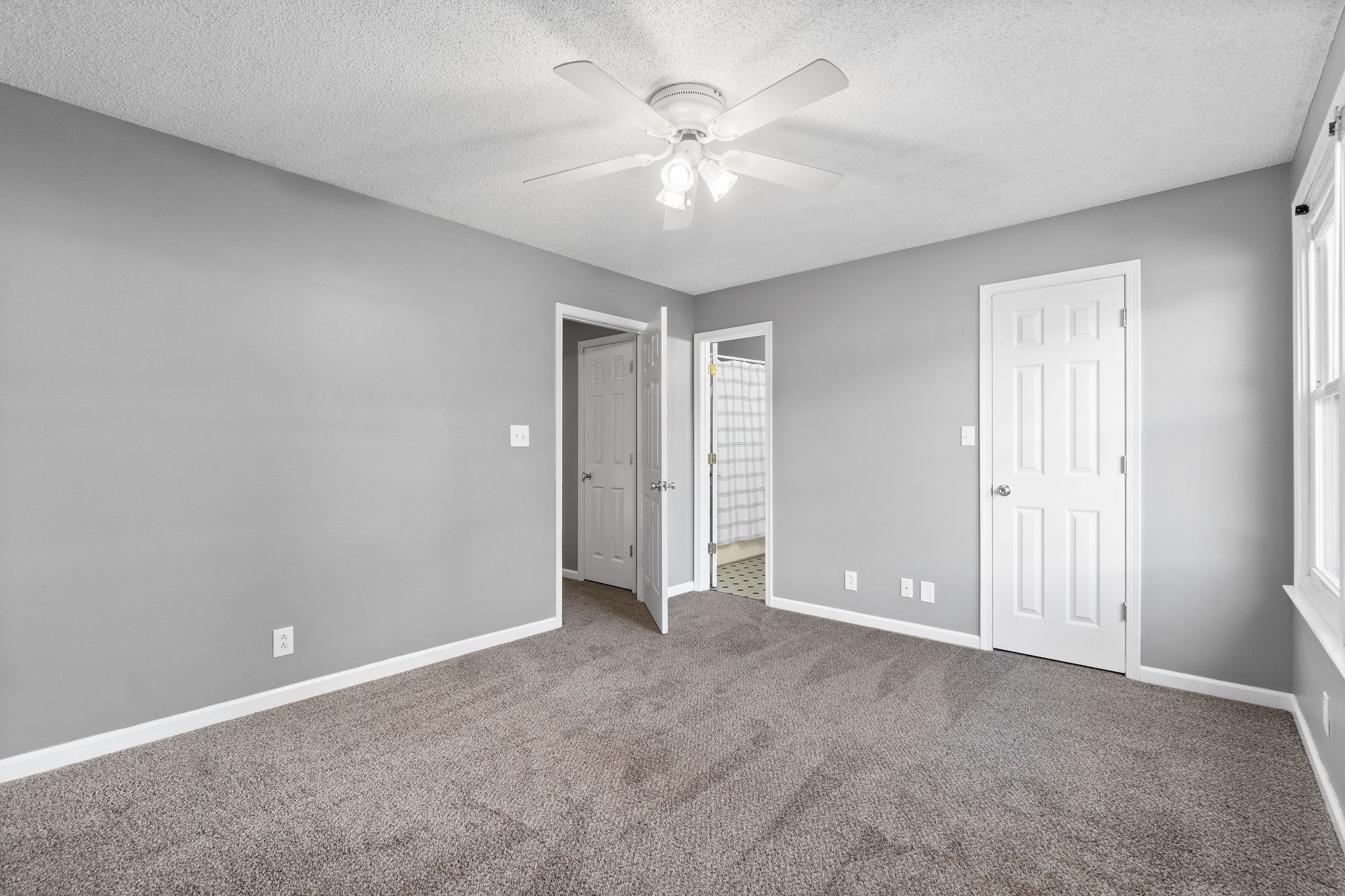 742 Needmore Road Clarksville, TN 37040 - Photo 19 of 35 a view of an empty room with a ceiling fan