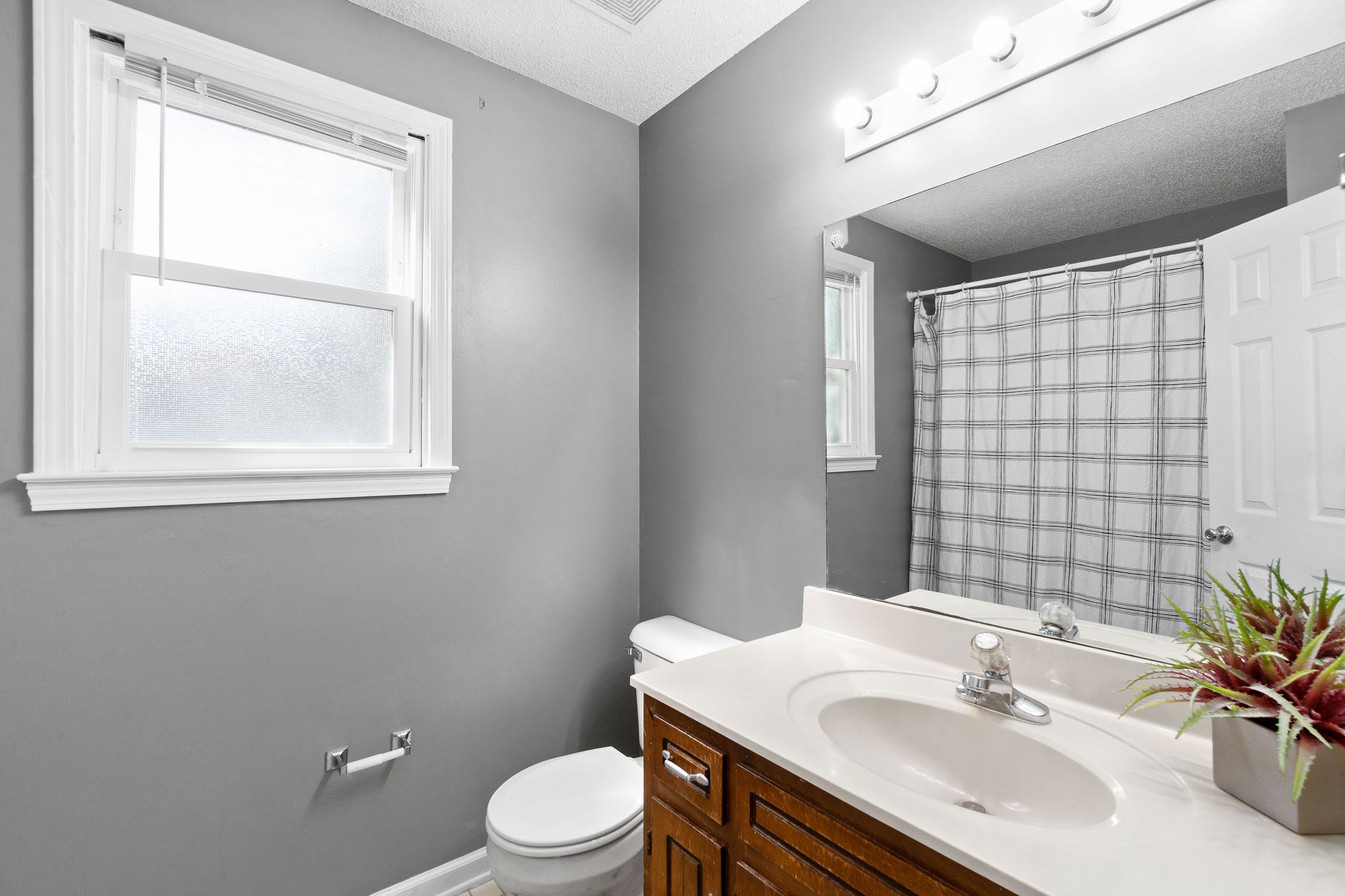 742 Needmore Road Clarksville, TN 37040 - Photo 20 of 35 a bathroom with a sink toilet and shower