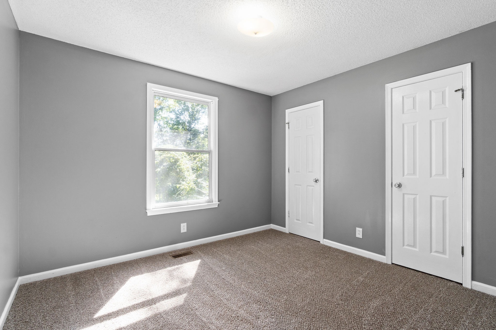 742 Needmore Road Clarksville, TN 37040 - Photo 23 of 35 a view of an empty room with a window