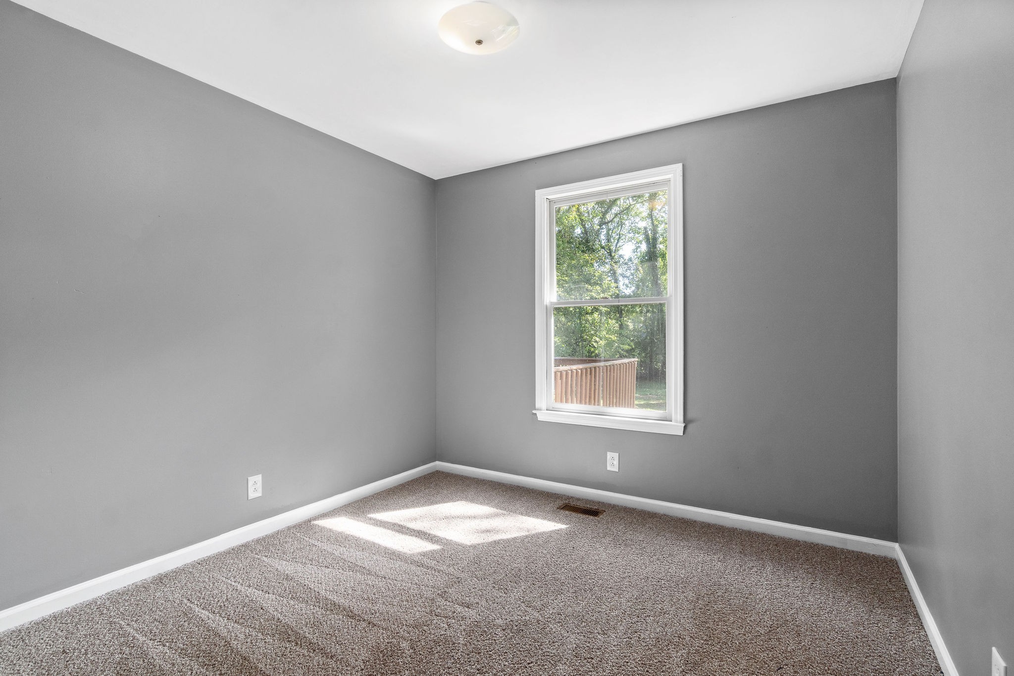 742 Needmore Road Clarksville, TN 37040 - Photo 25 of 35 an empty room with a window