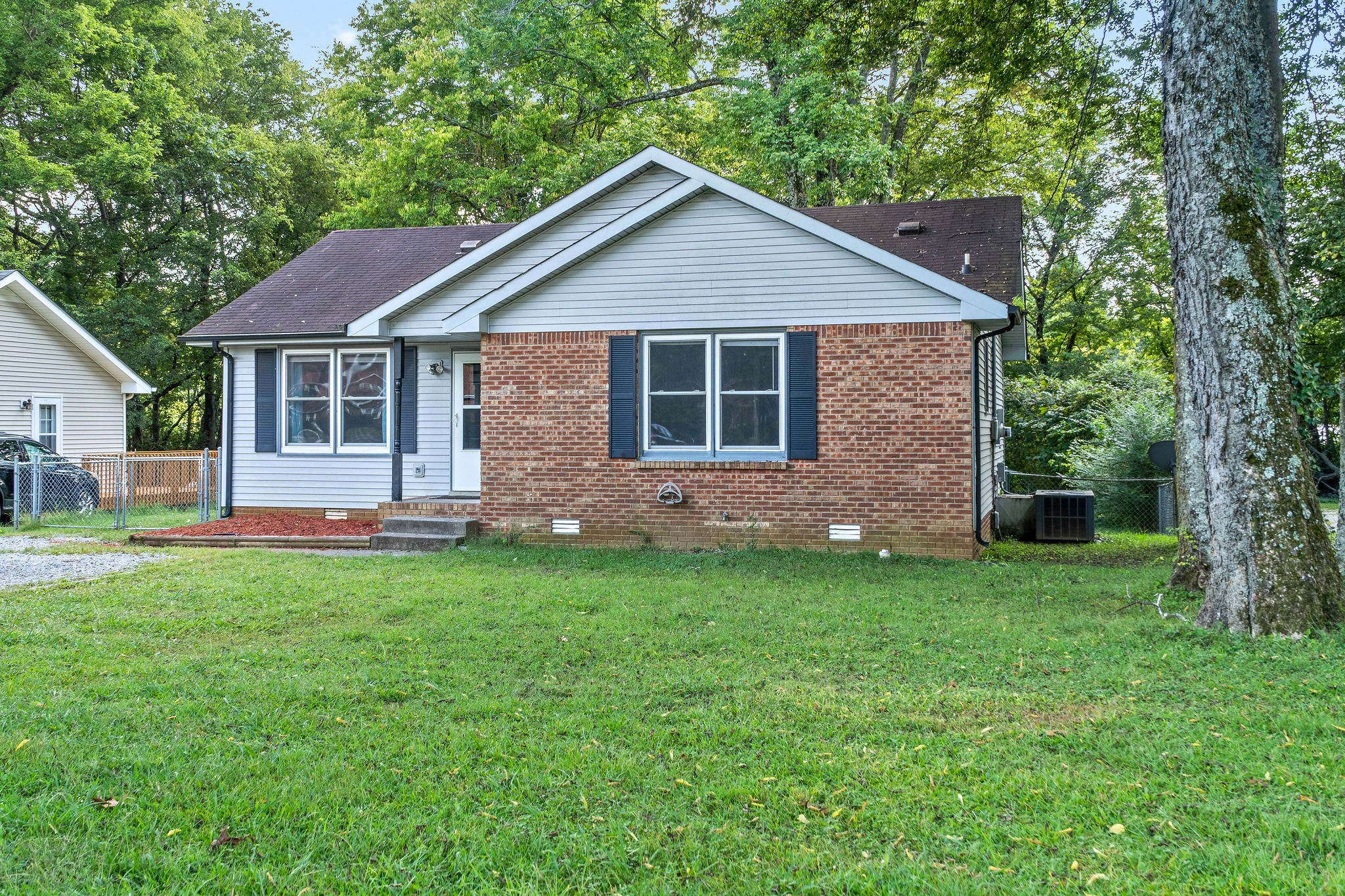 742 Needmore Road Clarksville, TN 37040 - Photo 34 of 35 a front view of a house with a yard