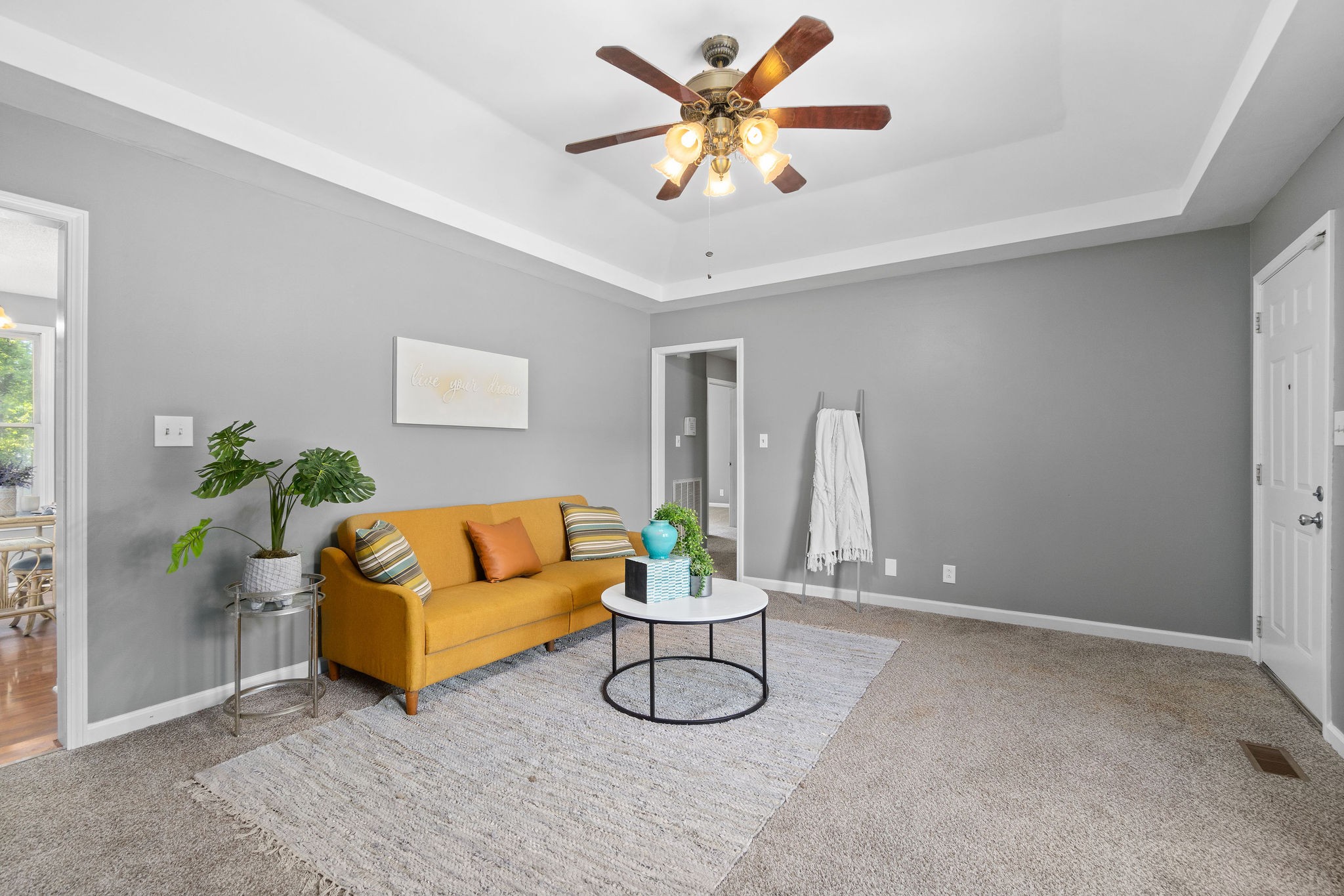 742 Needmore Road Clarksville, TN 37040 - Photo 7 of 35 a living room with furniture flowerpot and a potted plant