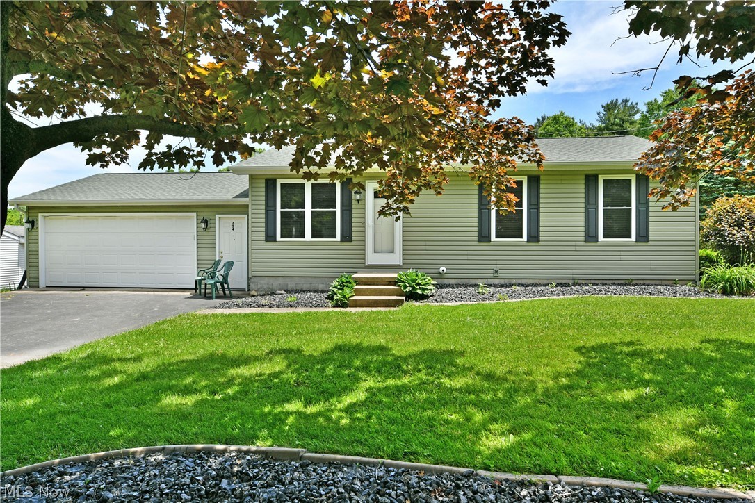 754 Warner Road Hubbard, OH 44425 - Photo 1 of 46 Ranch-style exterior with light green siding, white trim, and dark shutters