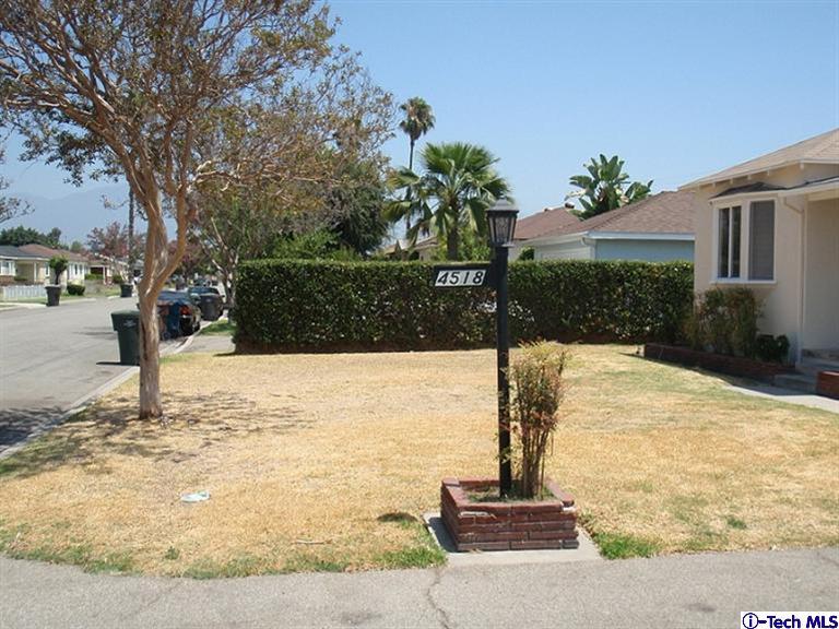 4518 Ranger Avenue El Monte, CA 91731 - Photo 19 of 20 a front view of a house with a yard
