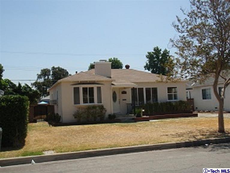4518 Ranger Avenue El Monte, CA 91731 - Photo 20 of 20 a front view of a house with a yard