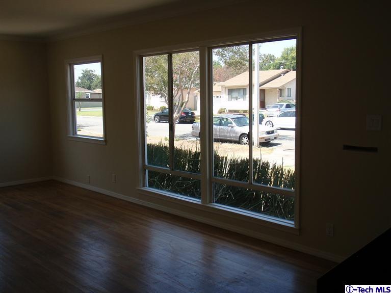 4518 Ranger Avenue El Monte, CA 91731 - Photo 10 of 20 a view of wooden floor wooden cabinets and a window