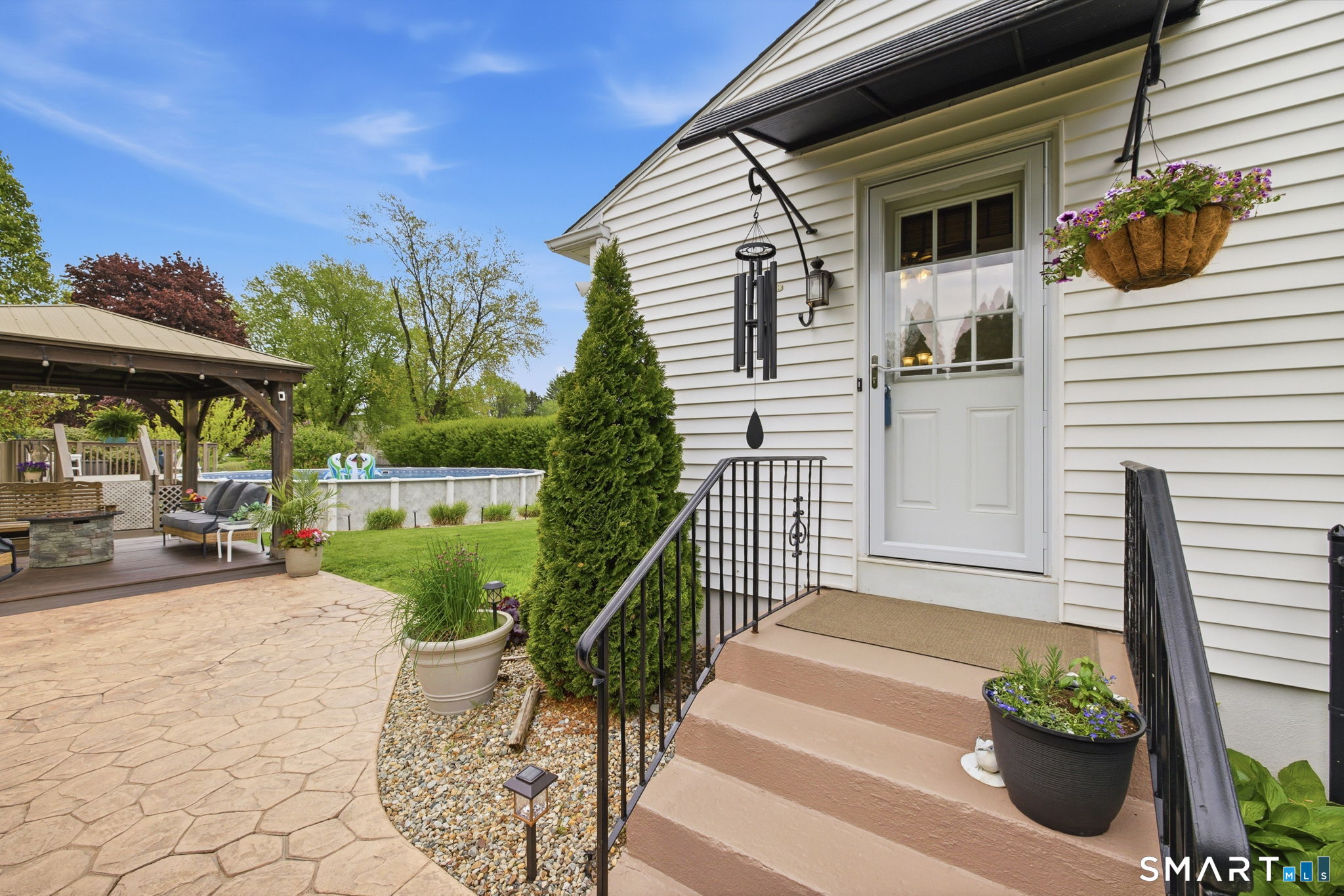 7 Stardust Drive Enfield, CT 06082 - Photo 26 of 38 a view of a house with backyard and sitting area