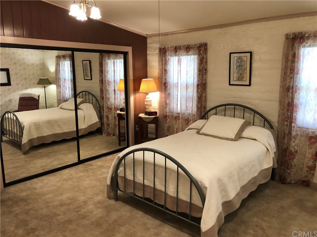 1865 Nacimiento Drive Paso Robles, CA 93446 - Photo 24 of 43 a bedroom with bed and a window