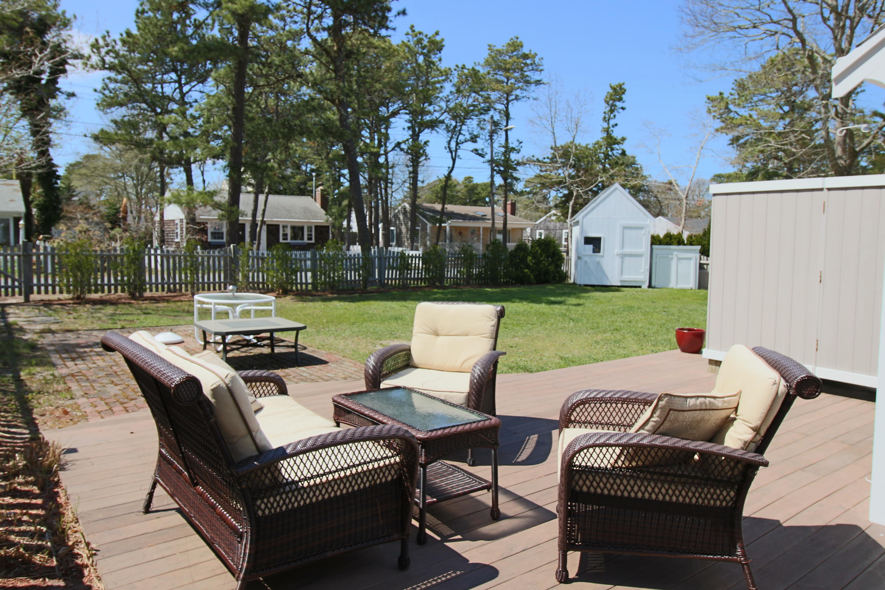 37 Beaten Road Dennis Port, MA 02639 - Photo 14 of 16 a view of a patio with chair table and chairs