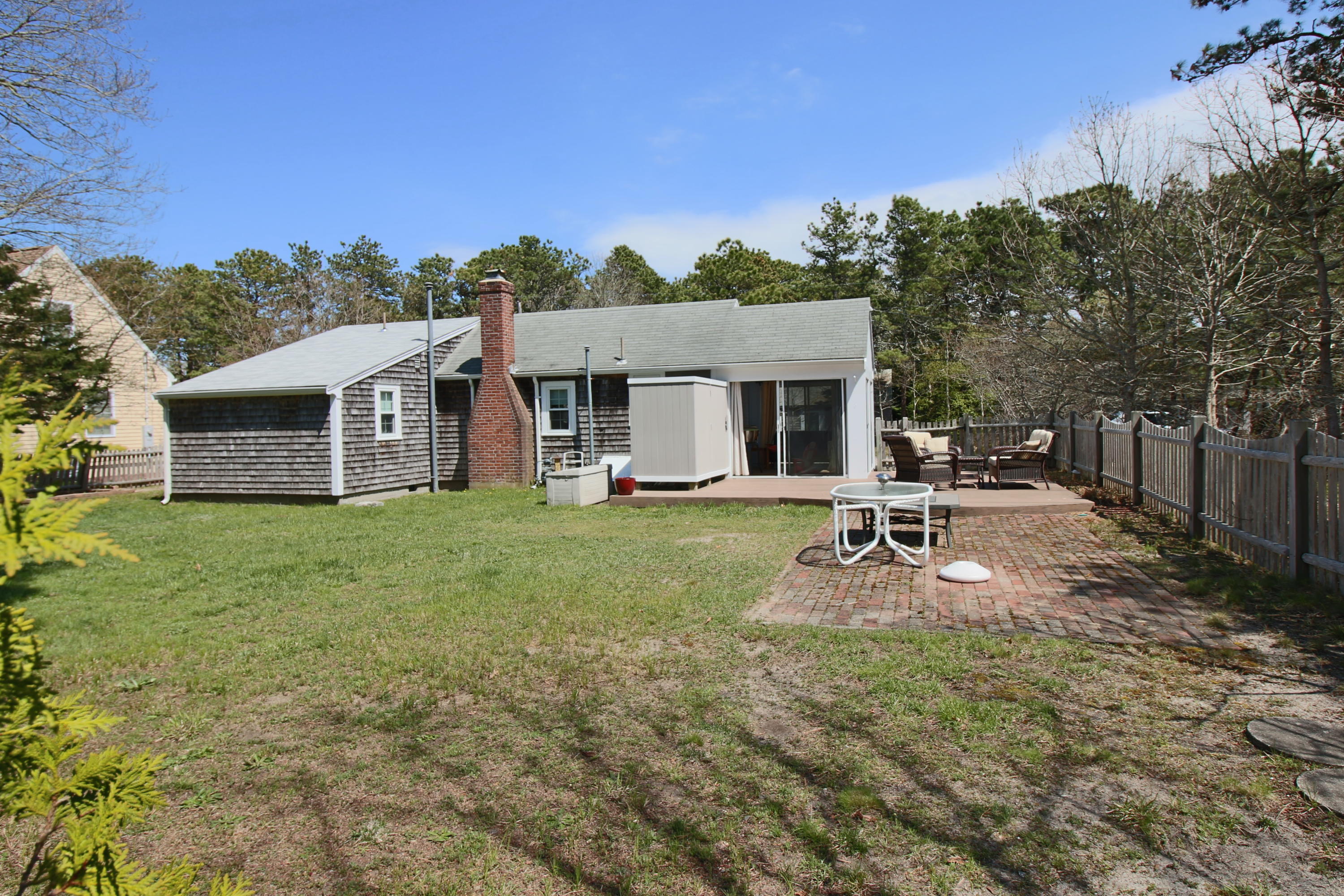 37 Beaten Road Dennis Port, MA 02639 - Photo 15 of 16 a view of a house with backyard porch and garden