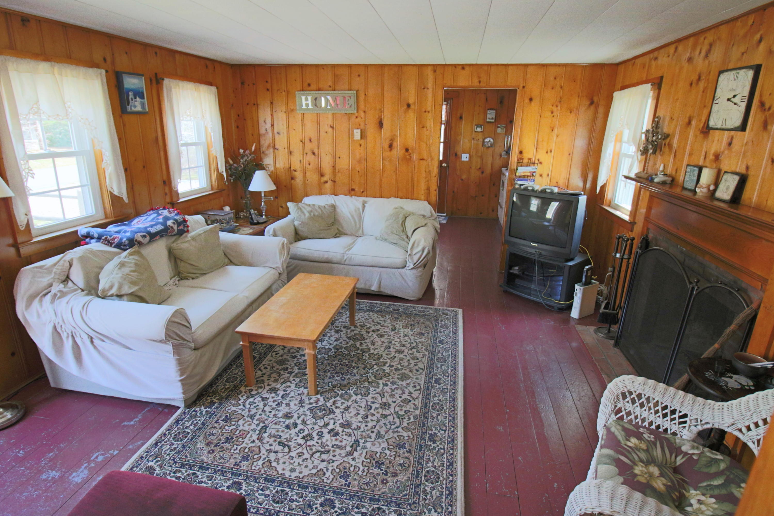 37 Beaten Road Dennis Port, MA 02639 - Photo 5 of 16 a living room with furniture and a flat screen tv