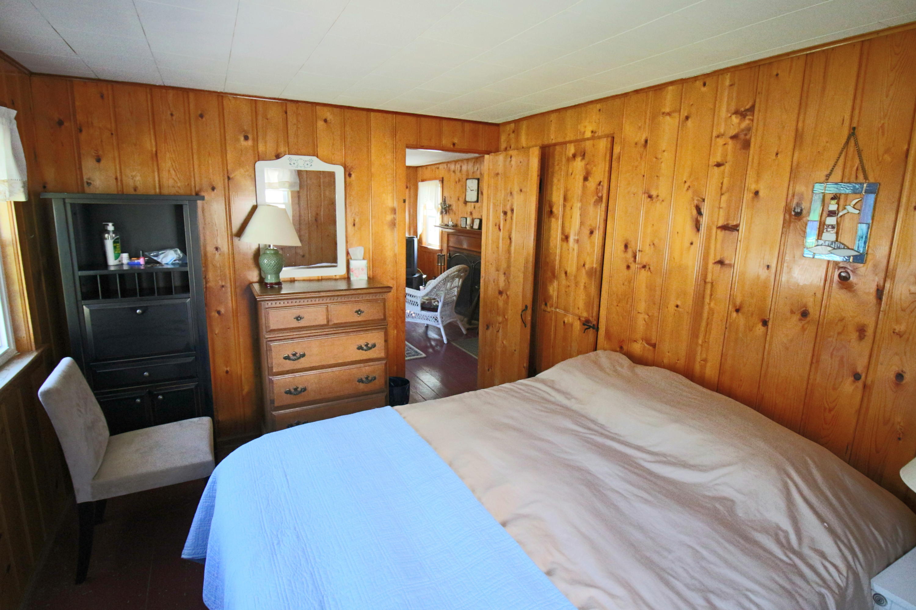 37 Beaten Road Dennis Port, MA 02639 - Photo 9 of 16 a bedroom with a bed and furniture