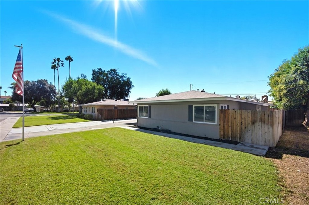 3495 Mono Drive Riverside, CA 92506 - Photo 1 of 36 a view of a backyard with potted plants and large tree