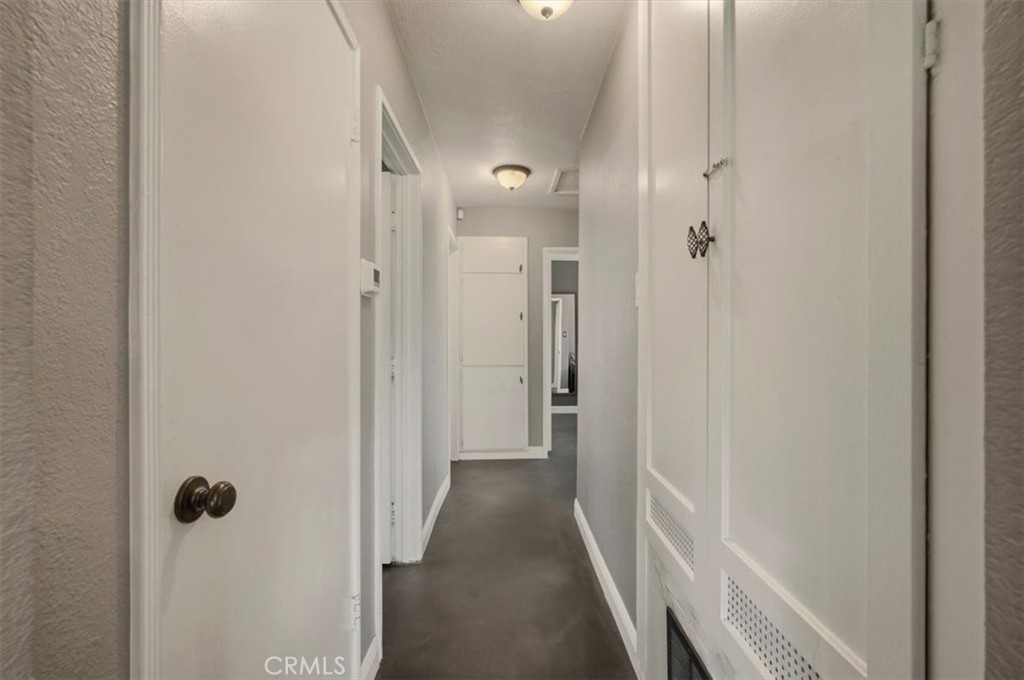3495 Mono Drive Riverside, CA 92506 - Photo 17 of 36 a view of a bathroom from a hallway