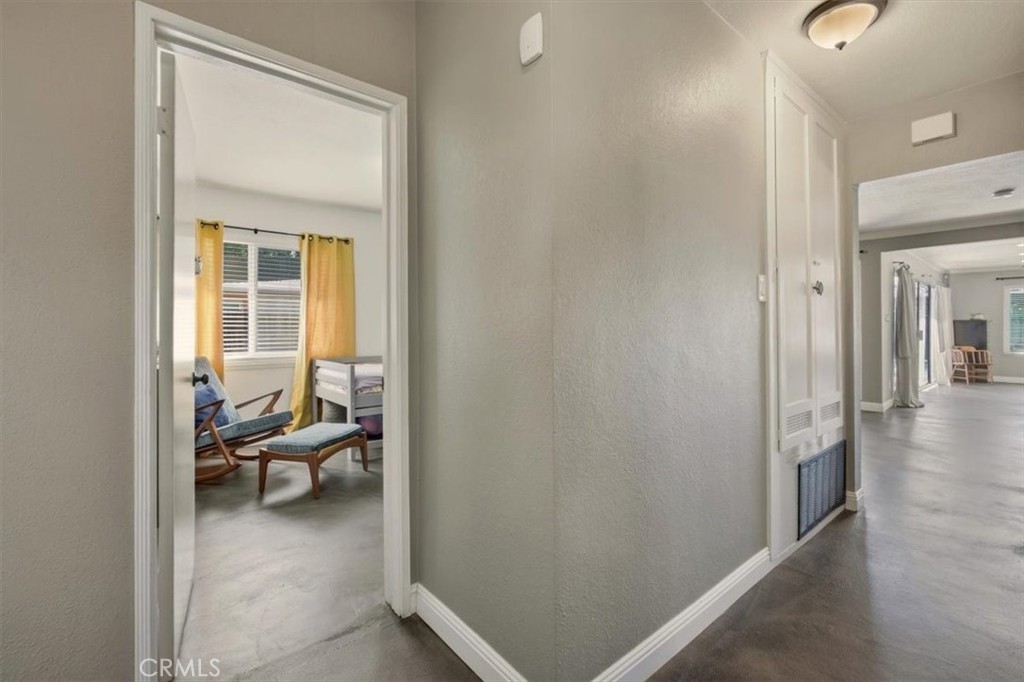 3495 Mono Drive Riverside, CA 92506 - Photo 20 of 36 a view of a hallway to a livingroom and a livingroom with furniture