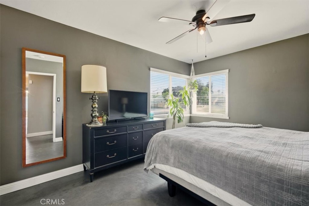 3495 Mono Drive Riverside, CA 92506 - Photo 23 of 36 a bedroom with a bed and a flat screen tv