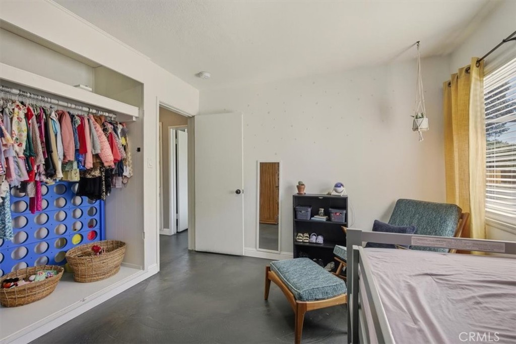 3495 Mono Drive Riverside, CA 92506 - Photo 24 of 34 a bedroom with a bed and a window