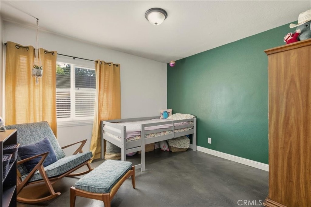 3495 Mono Drive Riverside, CA 92506 - Photo 25 of 36 a bedroom with furniture and a window