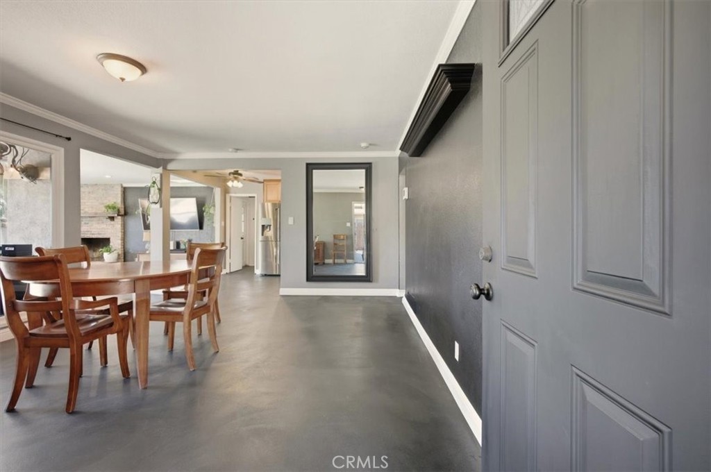 3495 Mono Drive Riverside, CA 92506 - Photo 6 of 36 a dining room with furniture and entryway