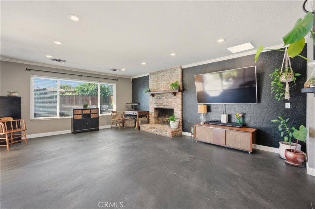 3495 Mono Drive Riverside, CA 92506 - Photo 10 of 36 a living room with furniture and a flat screen tv