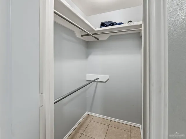 a view of a backyard with chairs