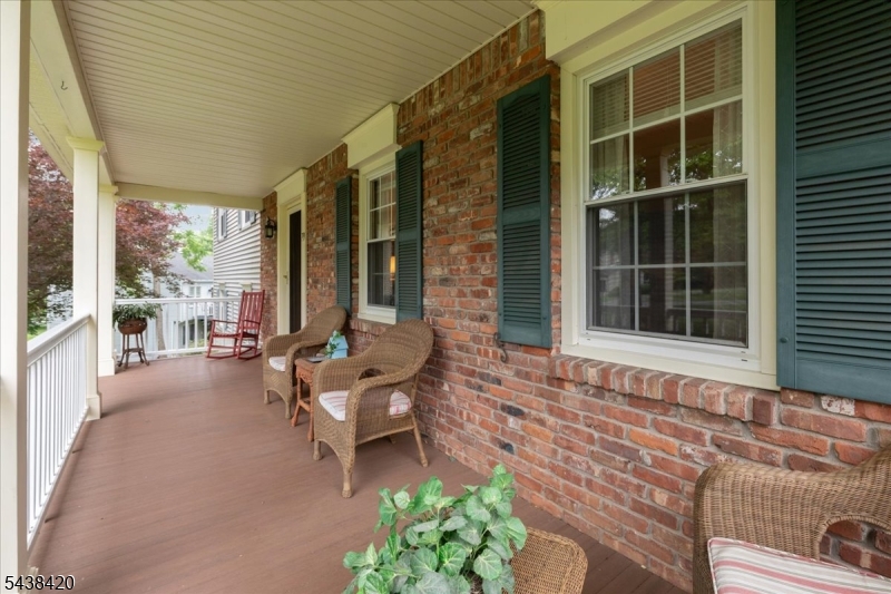 79 Main Street Califon, NJ 07830 - Photo 28 of 50 a balcony with furniture and a potted plant