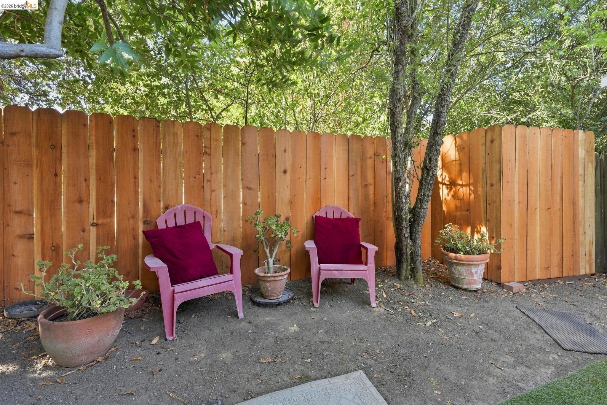5075 Alhambra Valley Road Martinez, CA 94553 - Photo 47 of 68 Wood-tone privacy fencing with a partial gravel ground surface