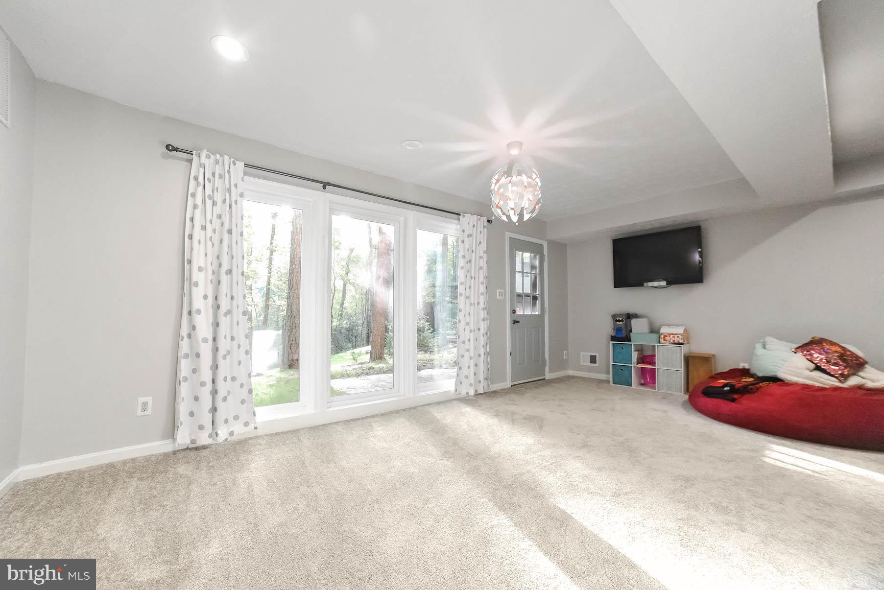 44575 Spinnaker Way California, MD 20619 - Photo 18 of 52 Big family room in the lower level
