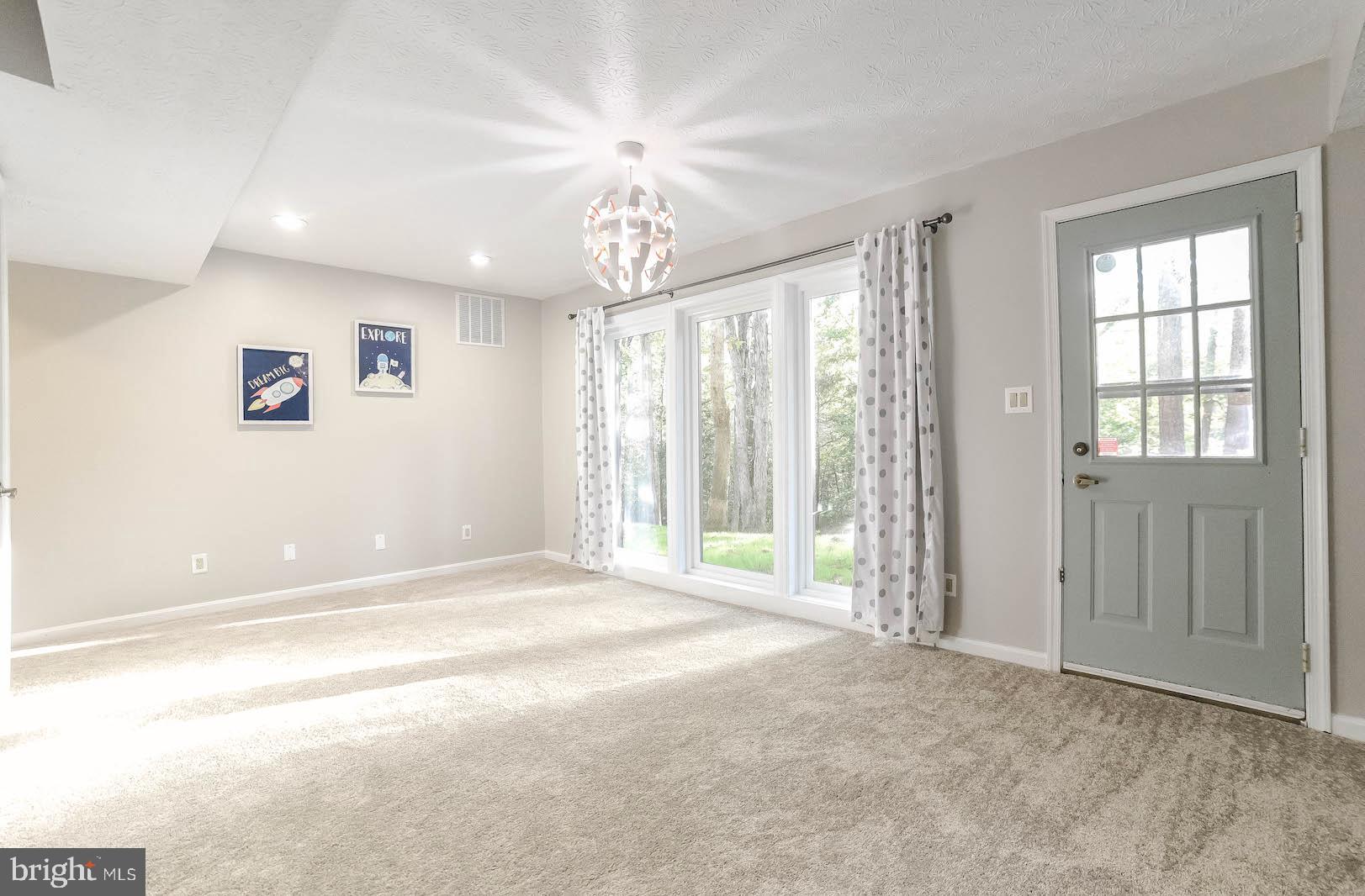44575 Spinnaker Way California, MD 20619 - Photo 22 of 52 New triple window brings in the sunshine