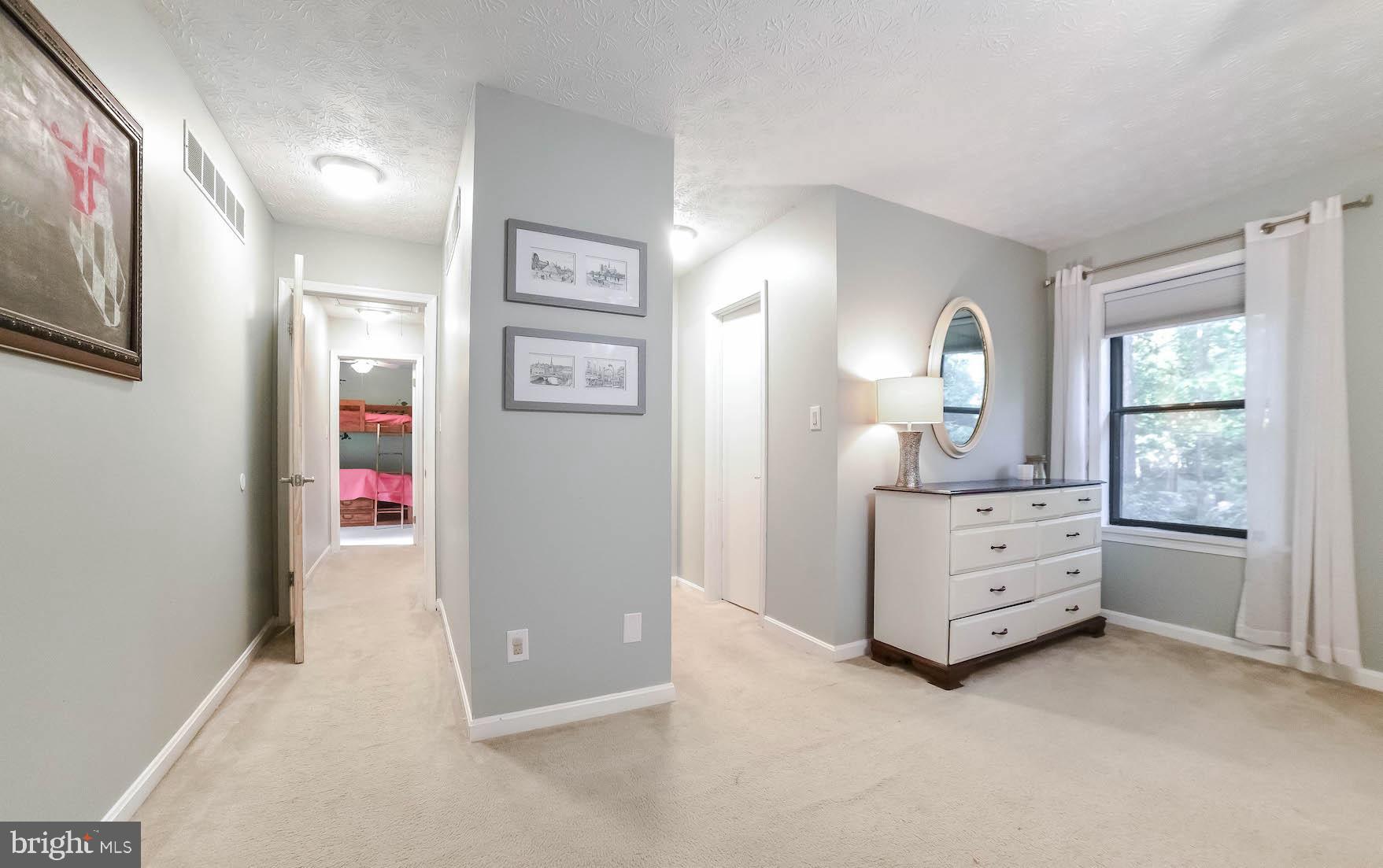 44575 Spinnaker Way California, MD 20619 - Photo 27 of 52 Entry to closets and bath on right
