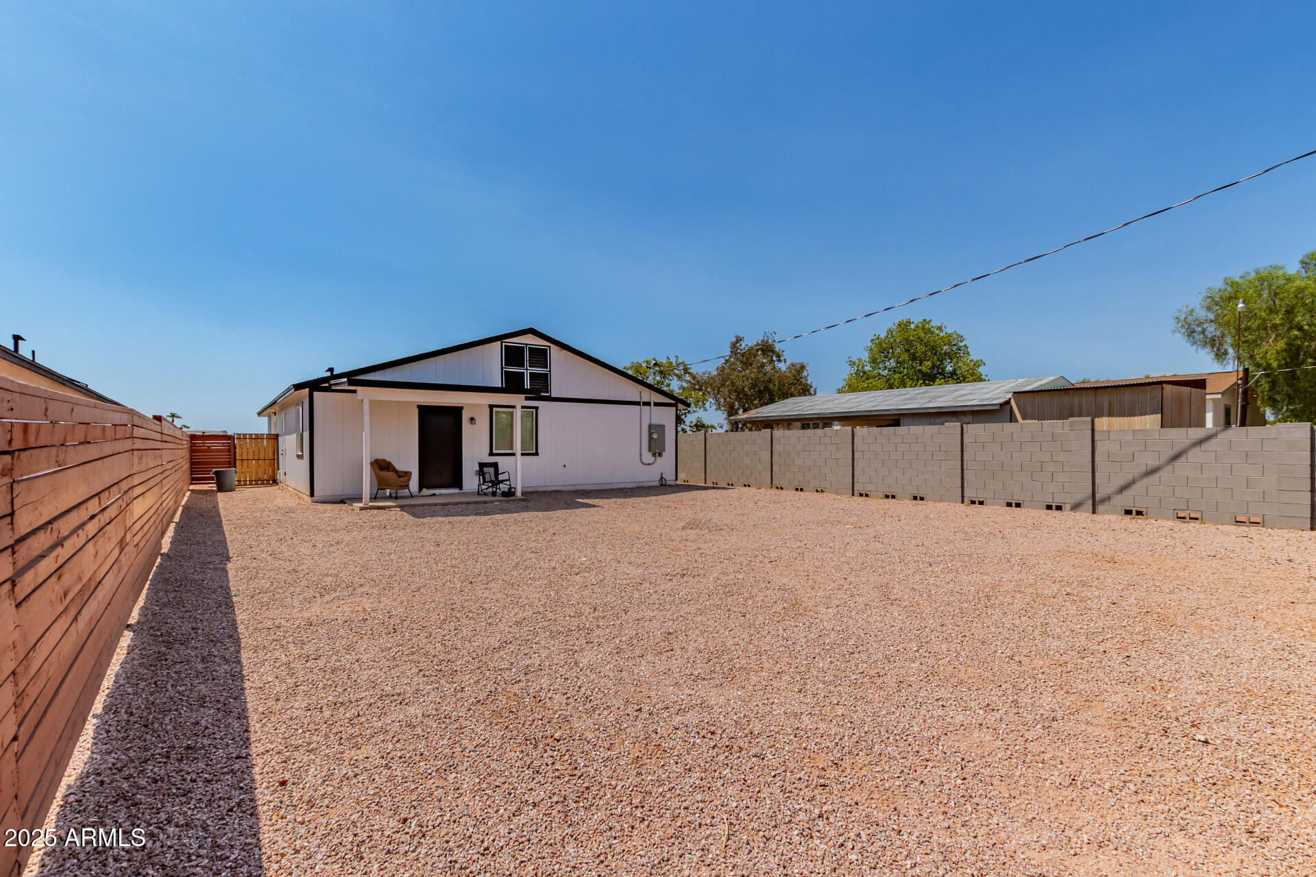 341 South Mountain Road, Unit 4 Apache Junction, AZ 85120 - Photo 16 of 18 a house view with a outdoor space