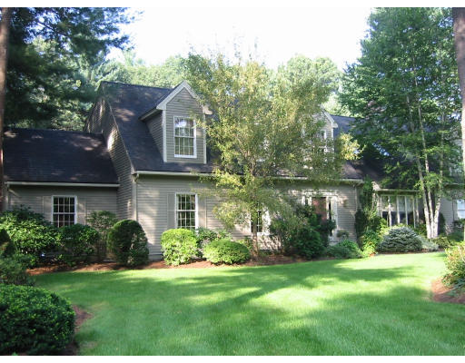 49 Phillips Road Sudbury, MA 01776 - Photo 1 of 1 a front view of a house with a yard