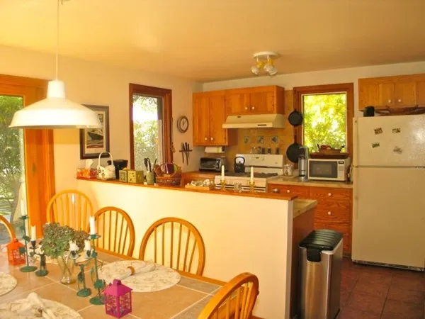 a very nice looking kitchen with a large window