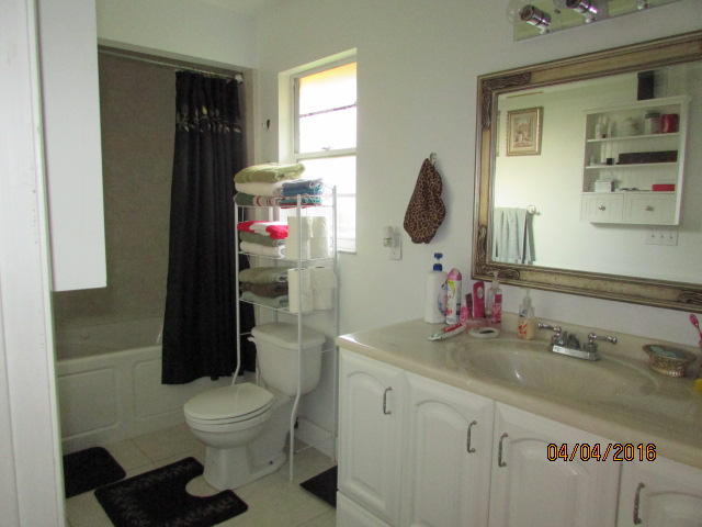8720 Hidden Pines Road Fort Pierce, FL 34945 - Photo 13 of 31 13 bathroom 1 master a