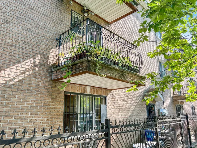 front view of a house with a balcony