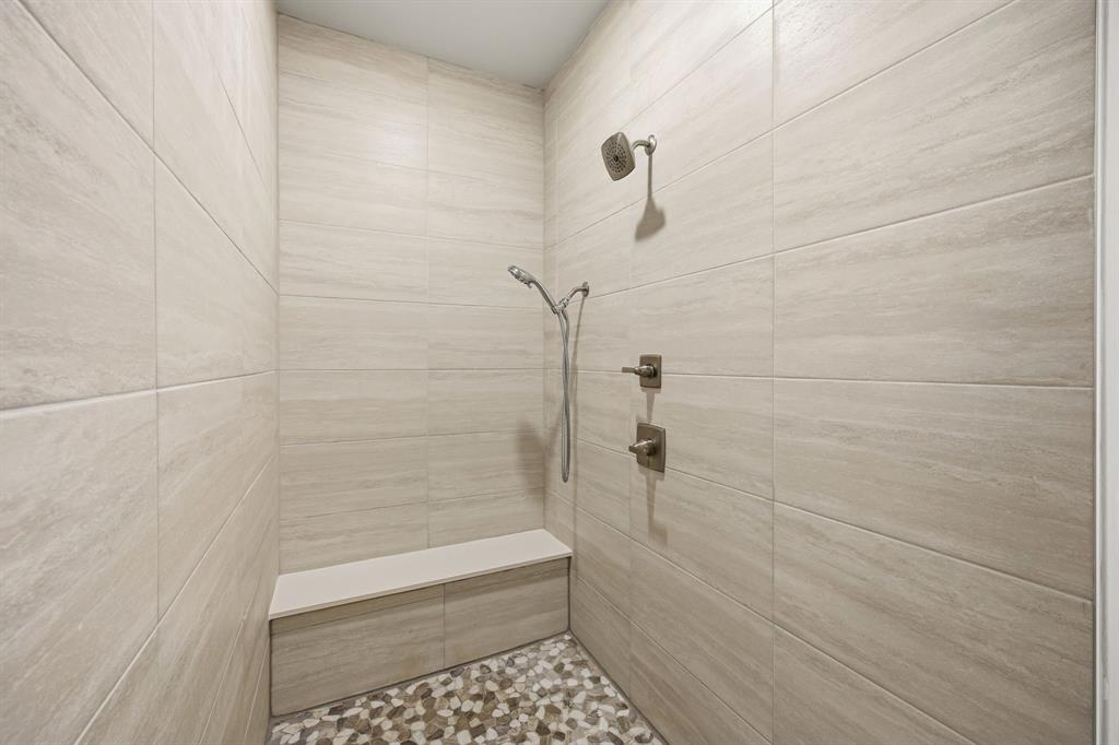 625 North Tyler Street, Unit 402 Dallas, TX 75208 - Photo 23 of 31 a bathroom with a shower