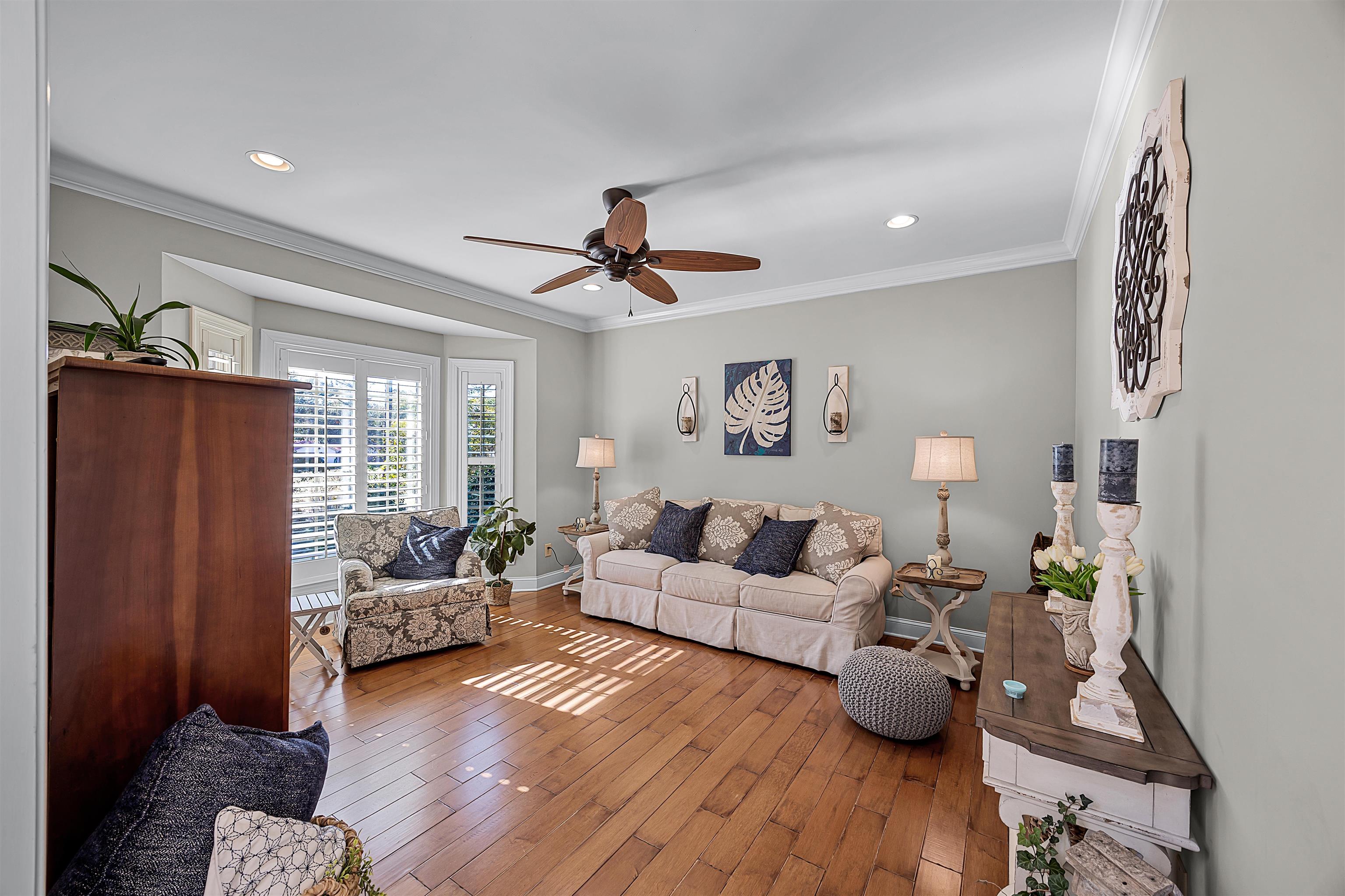 140 Legends Drive Counce, TN 38326 - Photo 15 of 30 Living area featuring ornamental molding, a ceiling fan, hardwood / wood-style flooring, and recessed lighting