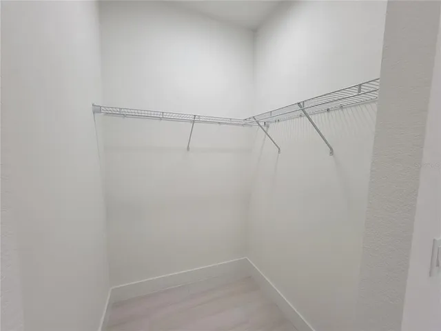 a view of a room with racks on the wall