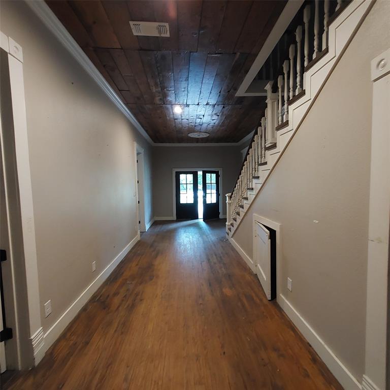 601 Holbrook Street Mount Vernon, TX 75457 - Photo 17 of 35 a view of entryway with stairs and wooden floor