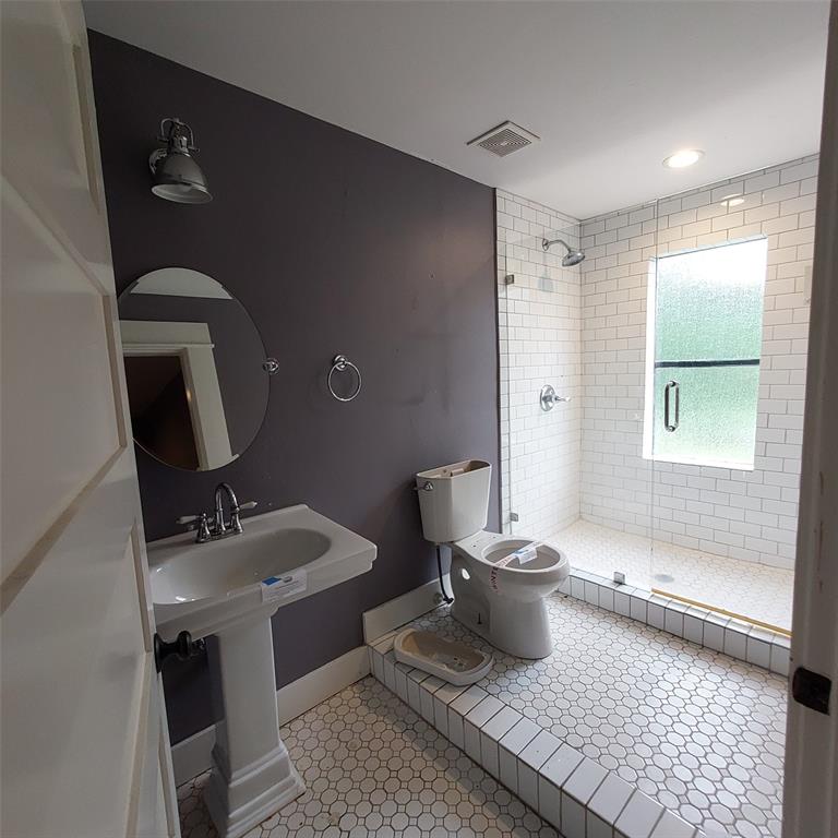 601 Holbrook Street Mount Vernon, TX 75457 - Photo 35 of 35 a bathroom with a sink and a mirror