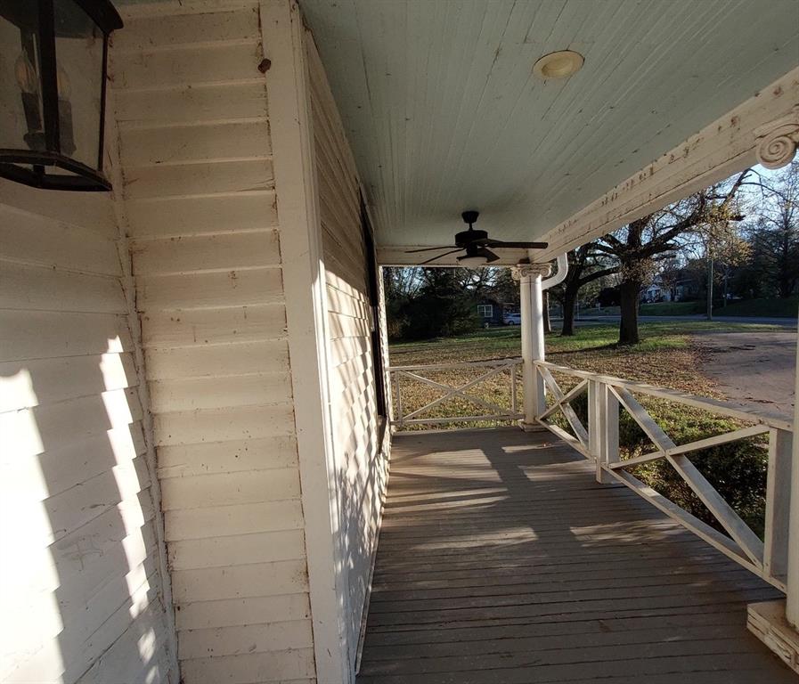 601 Holbrook Street Mount Vernon, TX 75457 - Photo 7 of 35 a view of a porch with wooden floor
