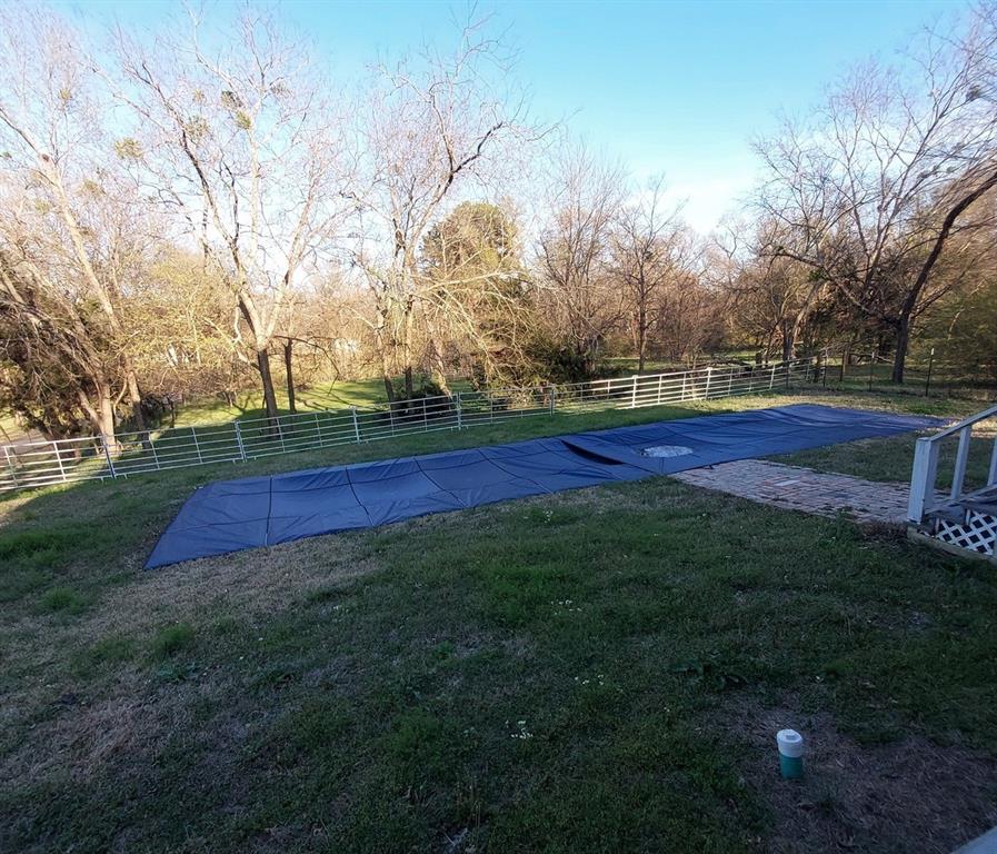 601 Holbrook Street Mount Vernon, TX 75457 - Photo 8 of 35 a view of yard with large trees