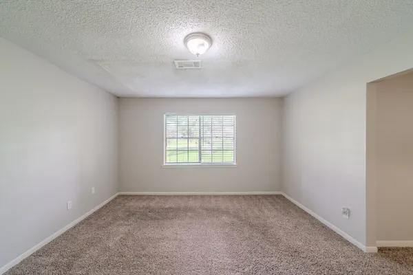 a bathroom with a double vanity sink and mirror