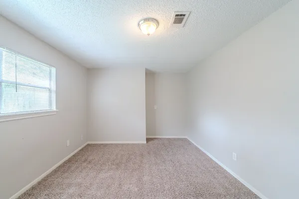 an empty room with a window