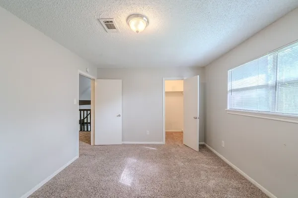 a view of kitchen and closet