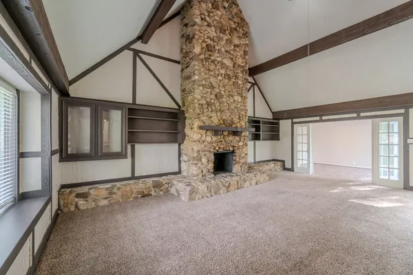 a view of a livingroom with a staircase