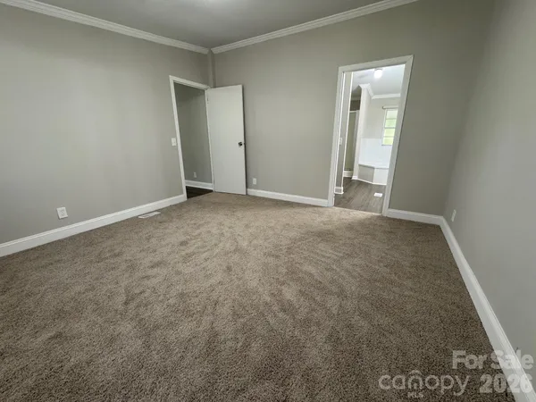 an empty room with an entryway