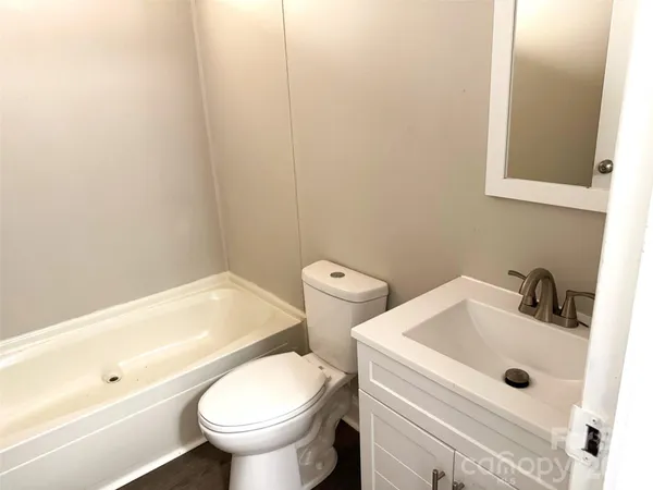 a bathroom with a sink and a toilet
